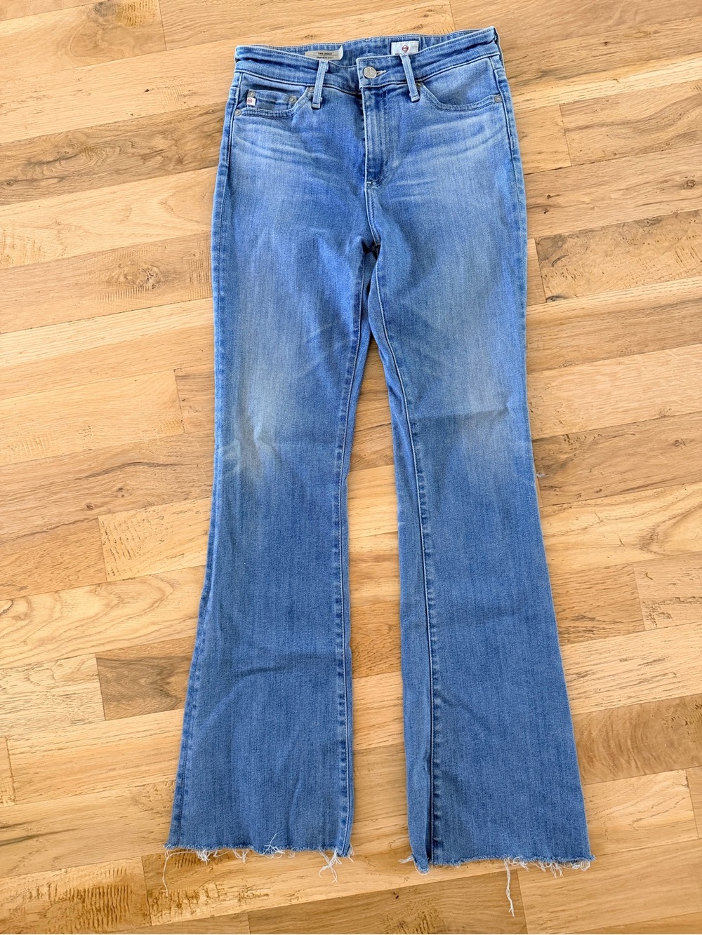 Ag Adriano Goldschmied Medium Blue Flare Jeans with Raw Hem